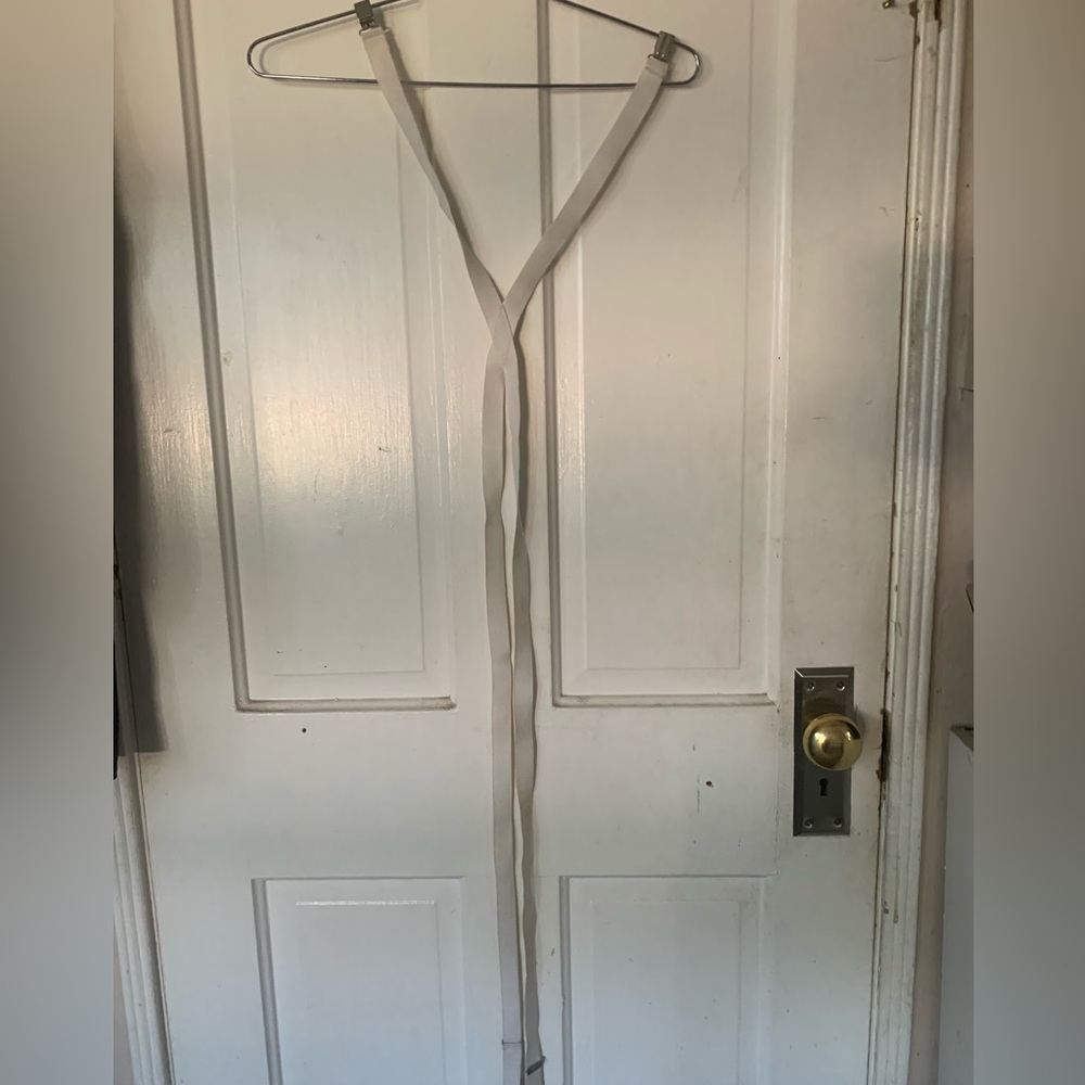 White clip on suspenders